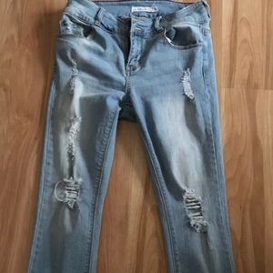 Light blue distressed skinny jeans